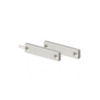 Contatti magnetici a scomparsa con spessore estremamente ridotto (4,5 mm) della </br>parte reed e della parte magnete. Connessione a filo con tamper </br>antimanomissione. Adatti per installazione su infissi di tipo Vasistas e </br>disponibili nei colori bianco e marrone. Tutti i contatti magnetici a scomparsa </br>sono conformi e certificati EN 50131-2-6.</br>