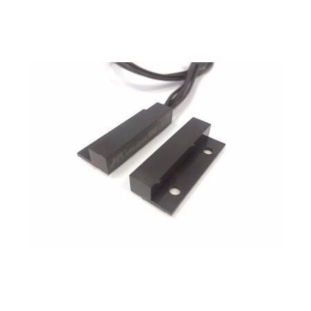 Contatto magnetico da esterno marrone. Reed Giapponese OKI mod.ORD9216 </br>normalmente chiuso. Contenitore in ABS rinforzato, fissaggio con biadesivo ad </br>alta resistenza. Massima distanza operativa tra il reed e il magnete 25mm. </br>Tensione massima applicabile 100Vdc/Vac. Massima corrente applicabile 0,5A. </br>Collegamento a 4 fili (2 per il contatto NC e 2 per l'antisabotaggio).</br>